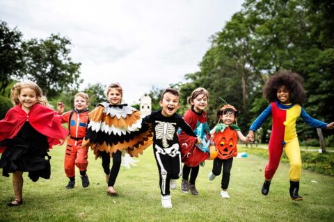 kids dressed in halloween costumes