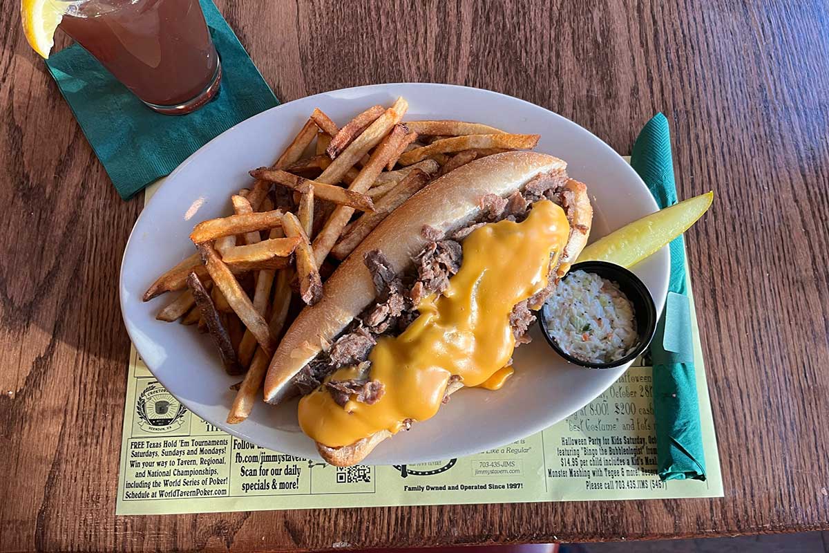 cheesesteak with fries at Jimmy's Old Town Tavern