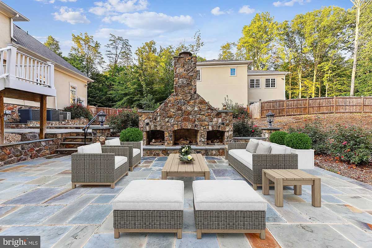 patio with stone fireplace