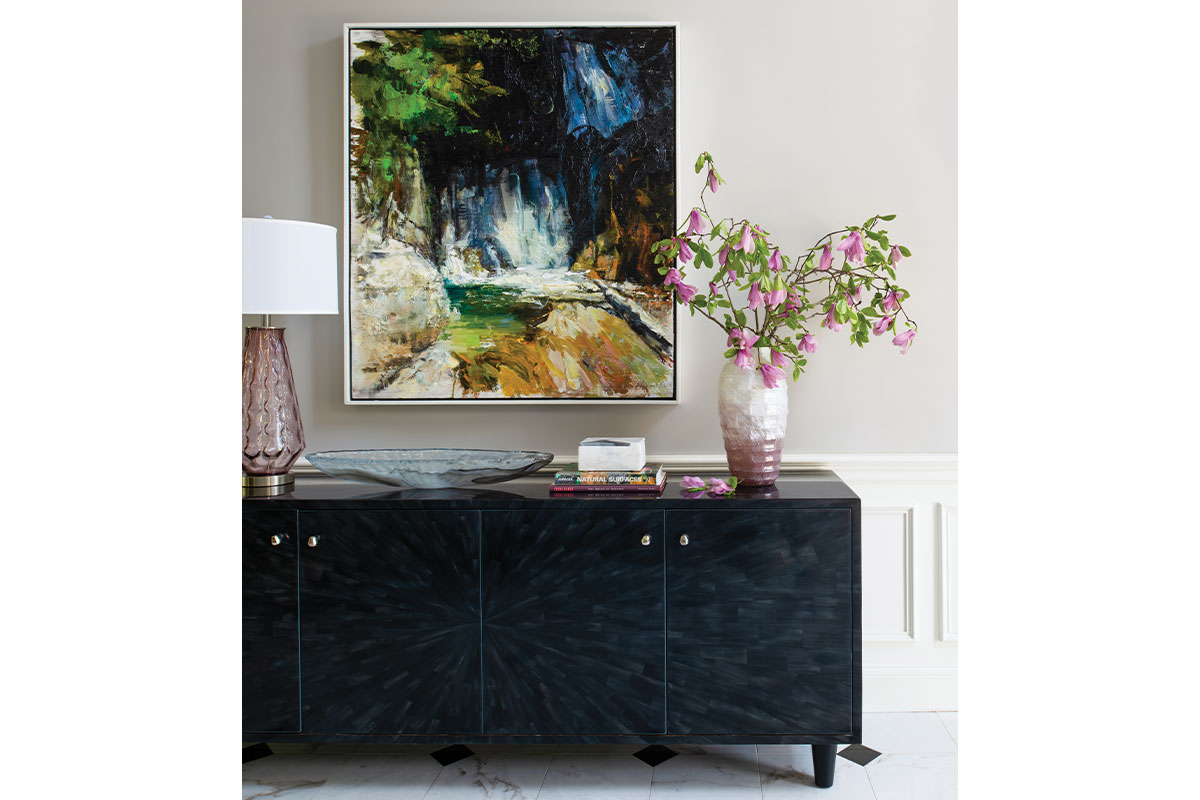 Cabinet with abstract art and flowers