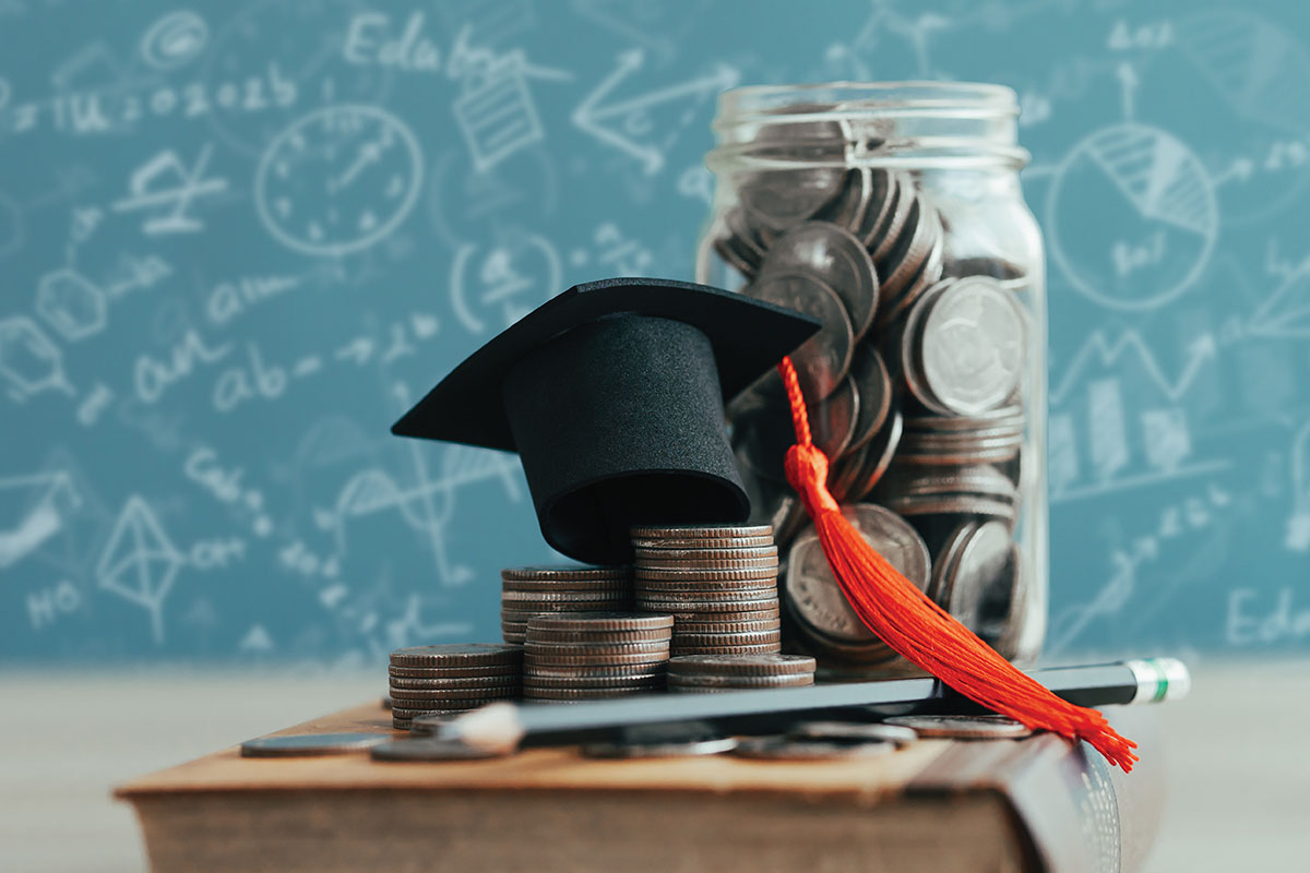 Savings jar with graduation cap