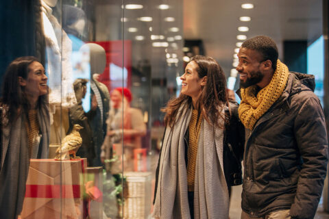 couple window shopping at mall