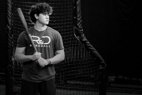 Kellan Clark with baseball bat