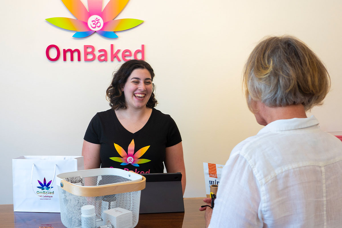 Customer checkout at OmBaked