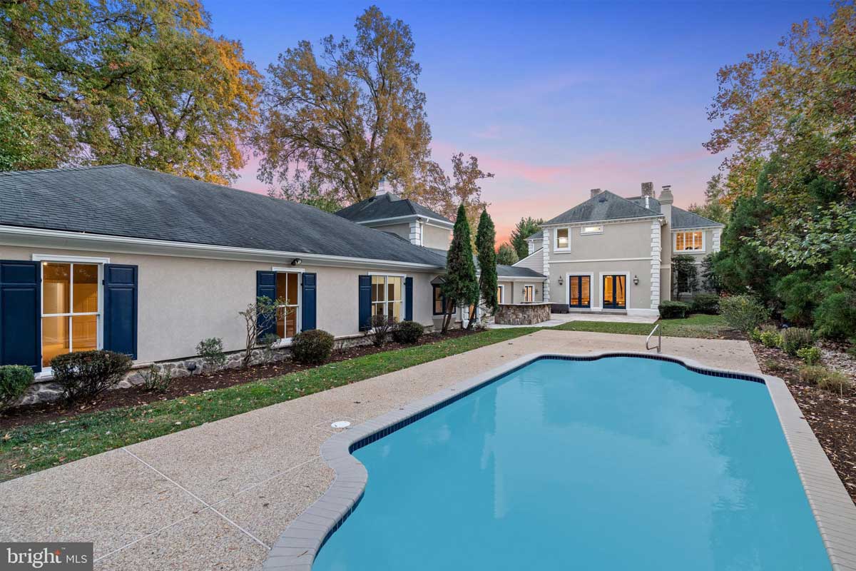 backyard with in-ground pool and guest house