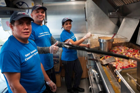 Great American Community Kitchen workers with food