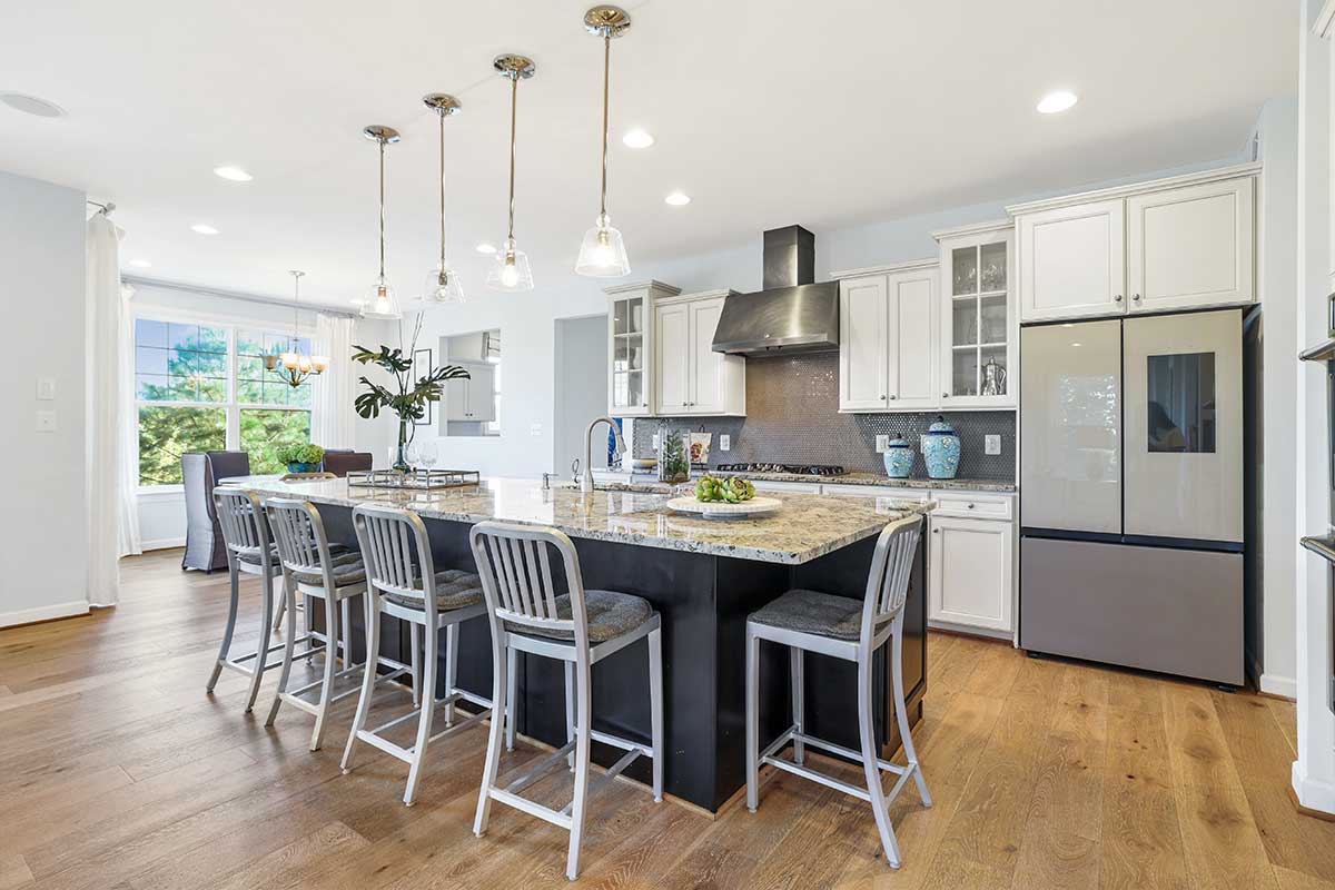 kitchen with island with quartz countertops