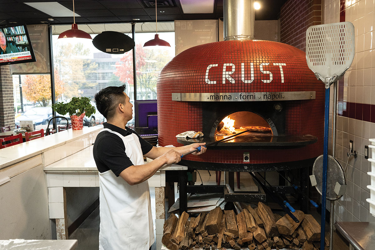 Wood-fired oven at Crust Pizzeria