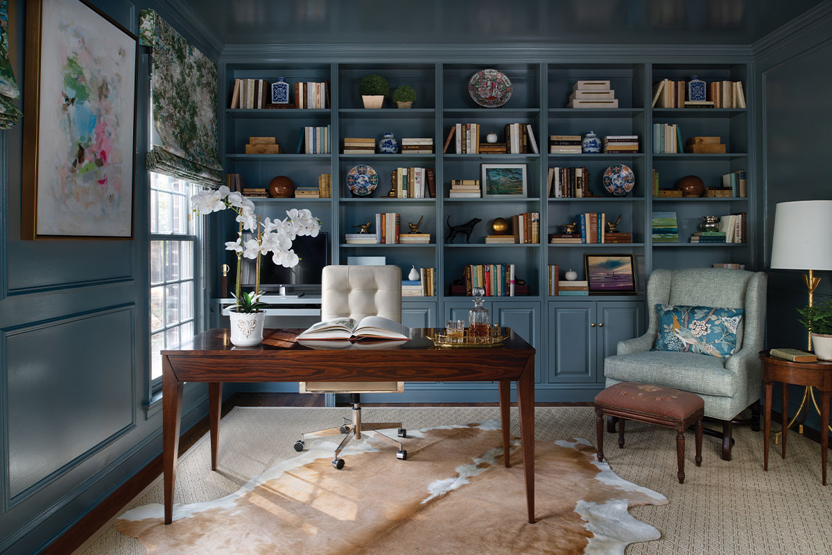 Home office with blue built-in bookshelf