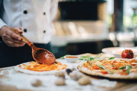 Chef making pizza