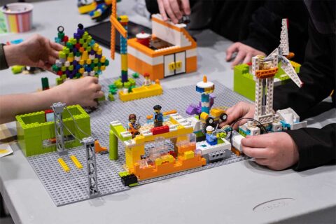 lego creation with cars and mini figures