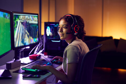 Girl playing desktop video game