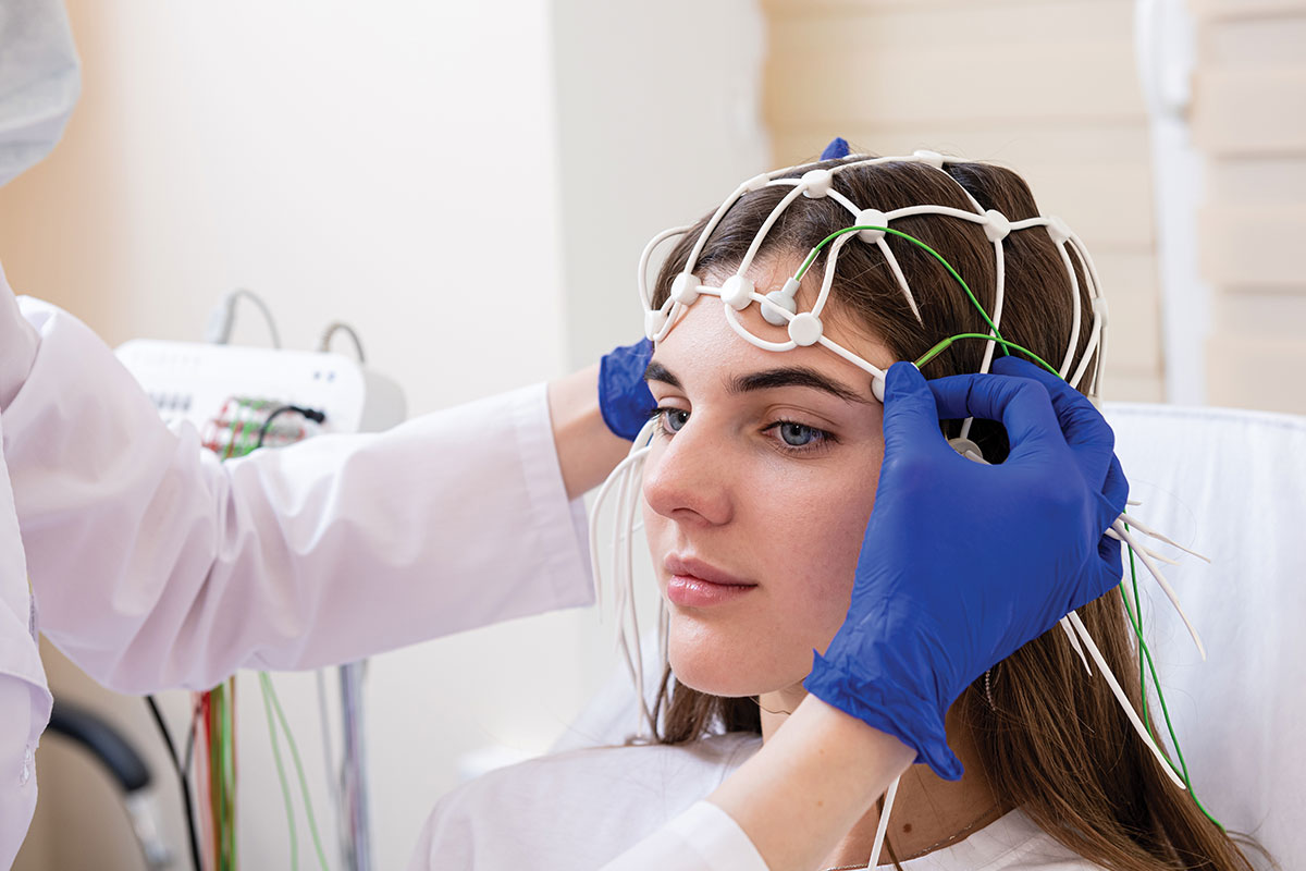Woman with EEG cap on