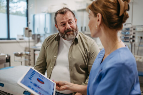 female doctor talking to patient