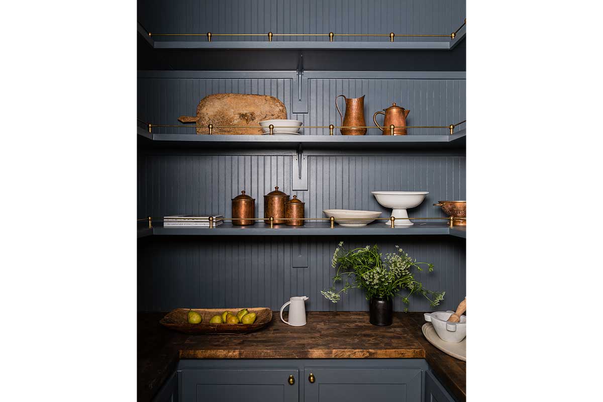 butler's pantry with dark blue paint
