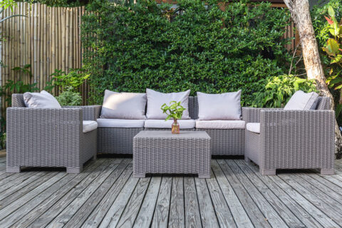 patio chairs and sofa on deck