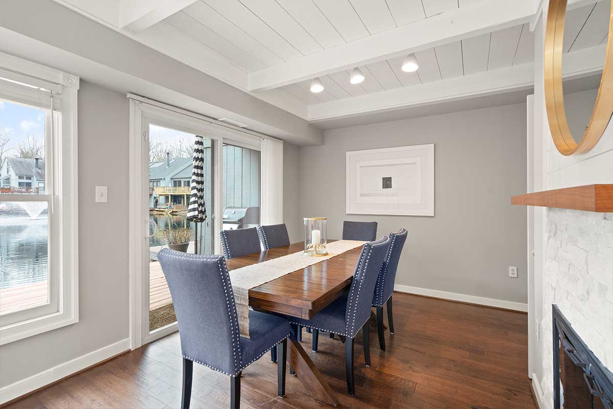 grey dining room with flireplace