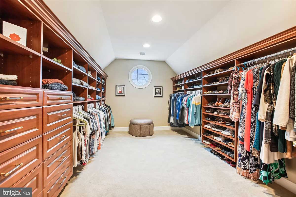 walk-in closet with wood accents