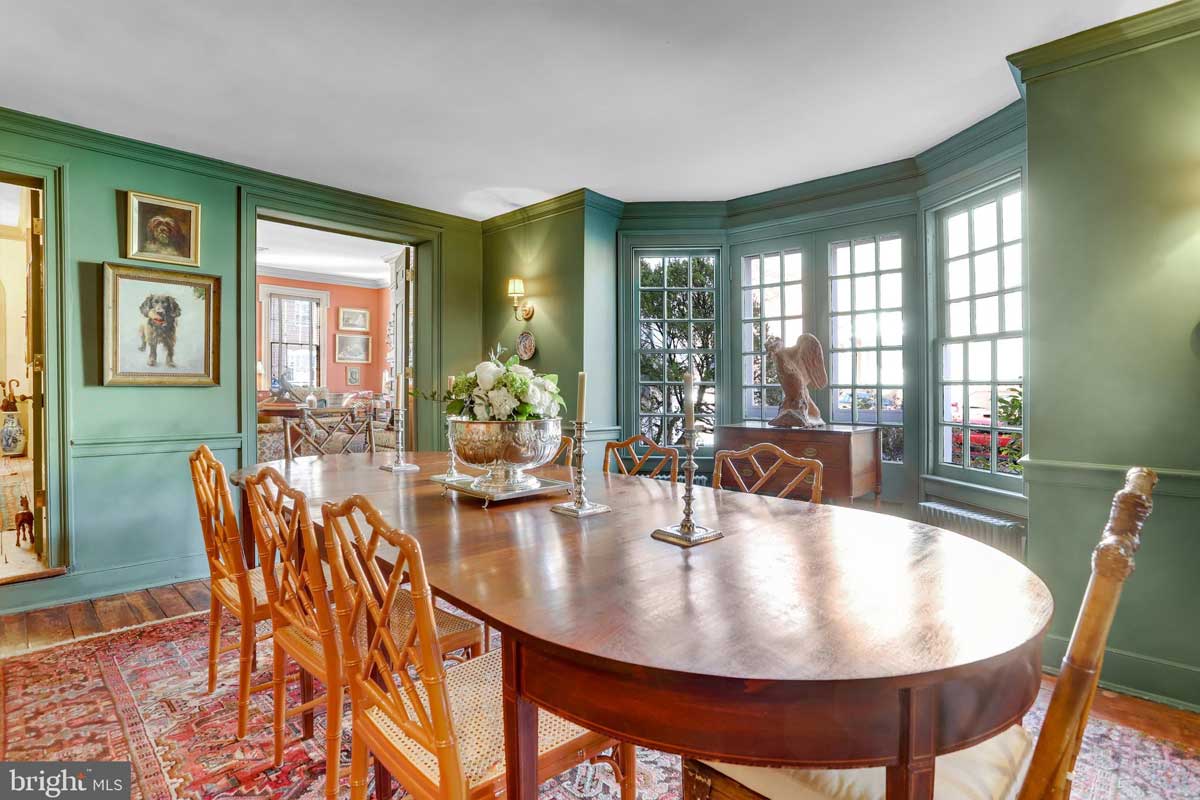 green dining room with french doors