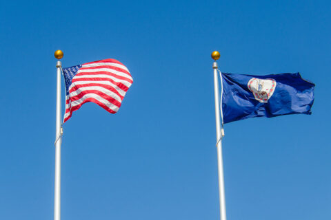 U.S. flag and Virginia flag in the wind