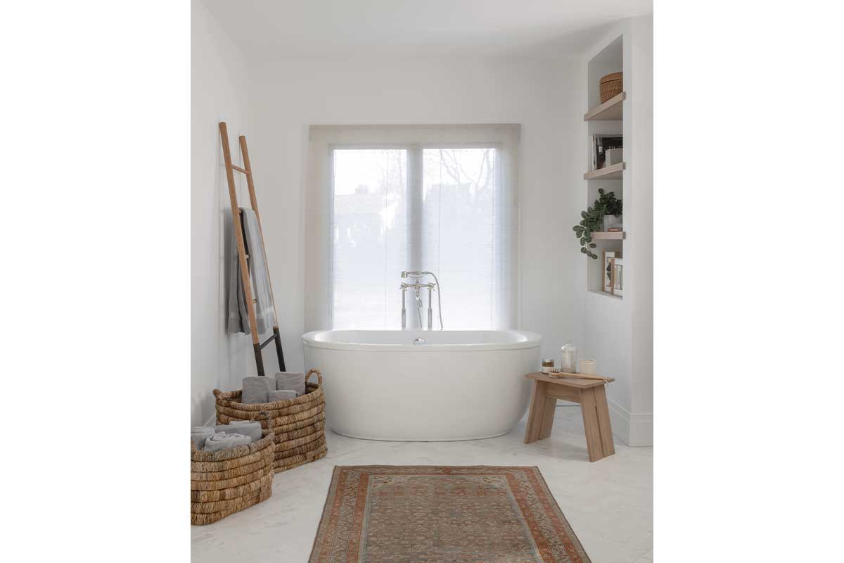 white soaking tub with nautral accents