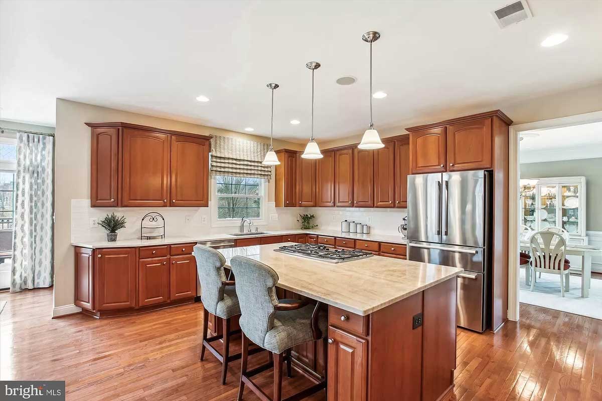 kitchen with island and wood cabinets