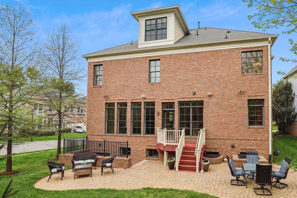 brick patio with two sitting areas