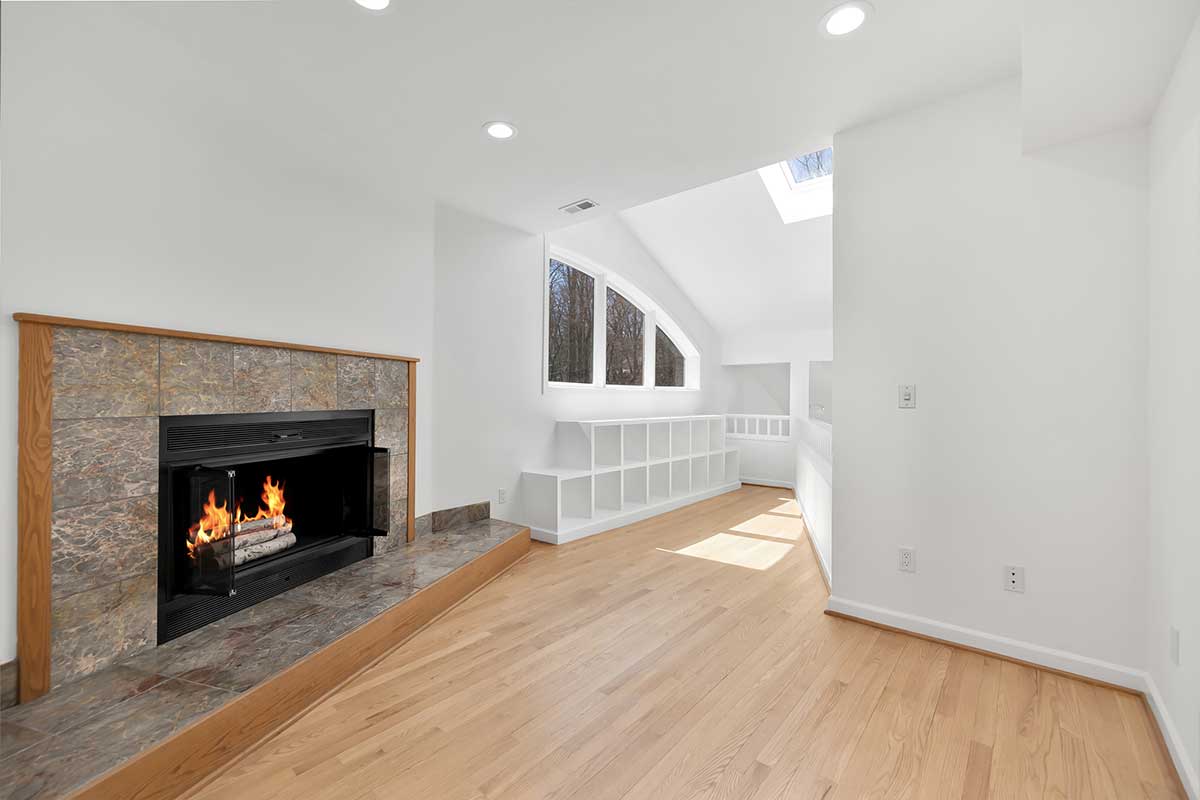 upper level loft with fireplace