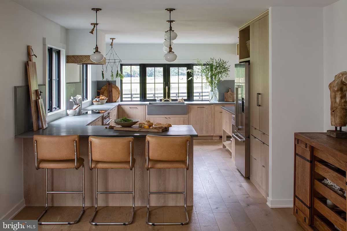 kitchen with island seating and natural wood cabinets