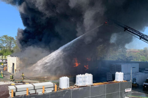 Sterling warehouse fire with black smoke