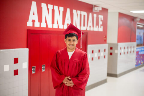 Samiullah Luddin in graduation gown at Annandale High School