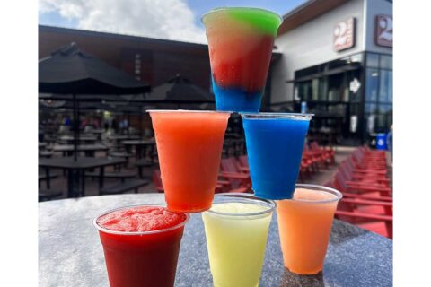 tower of colorful boozy slushies