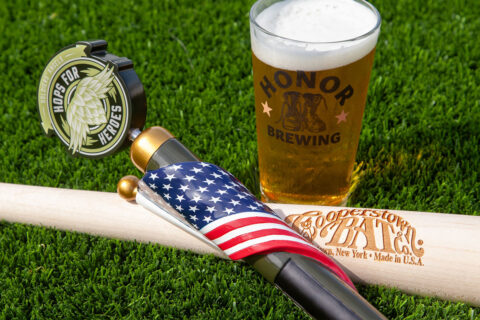 Beer, engraved bat, and tap handle from Honor Brewing