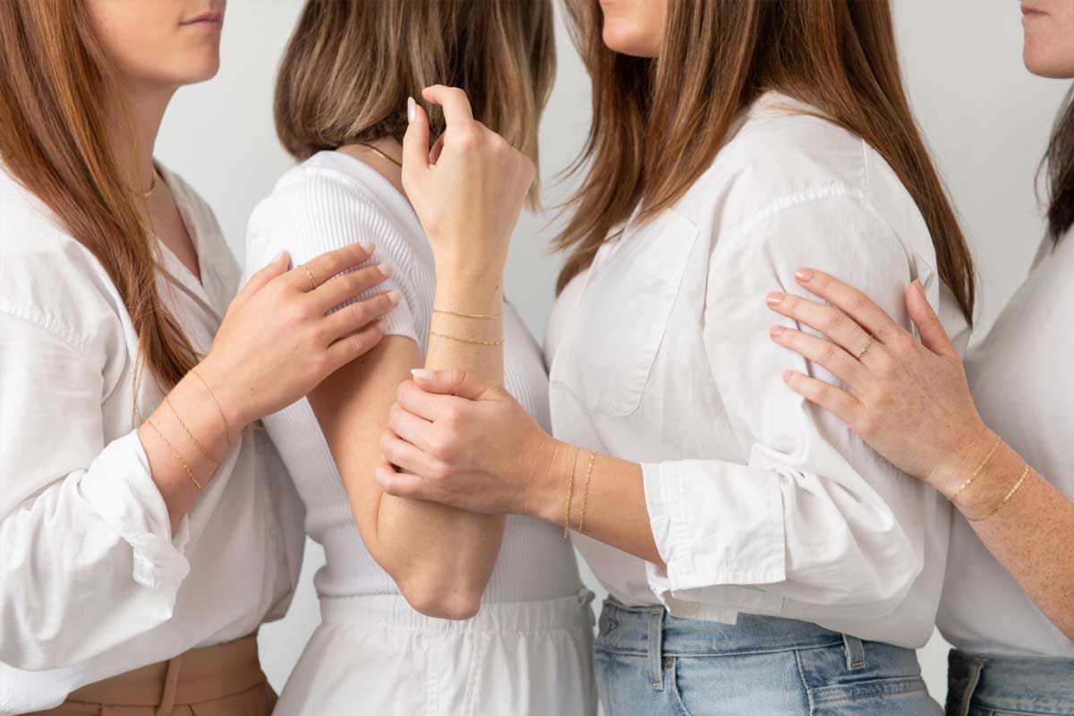 women with permanent jewelry