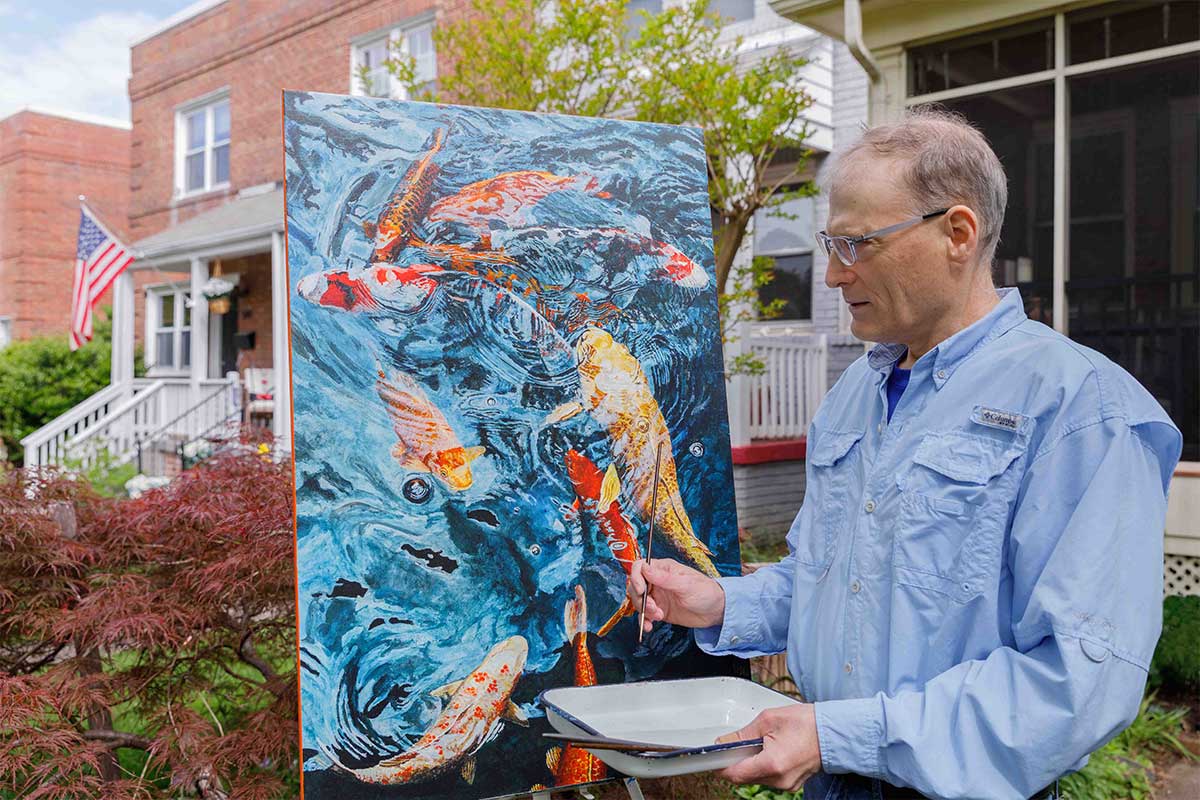 artist jeff lodge painting koi fish