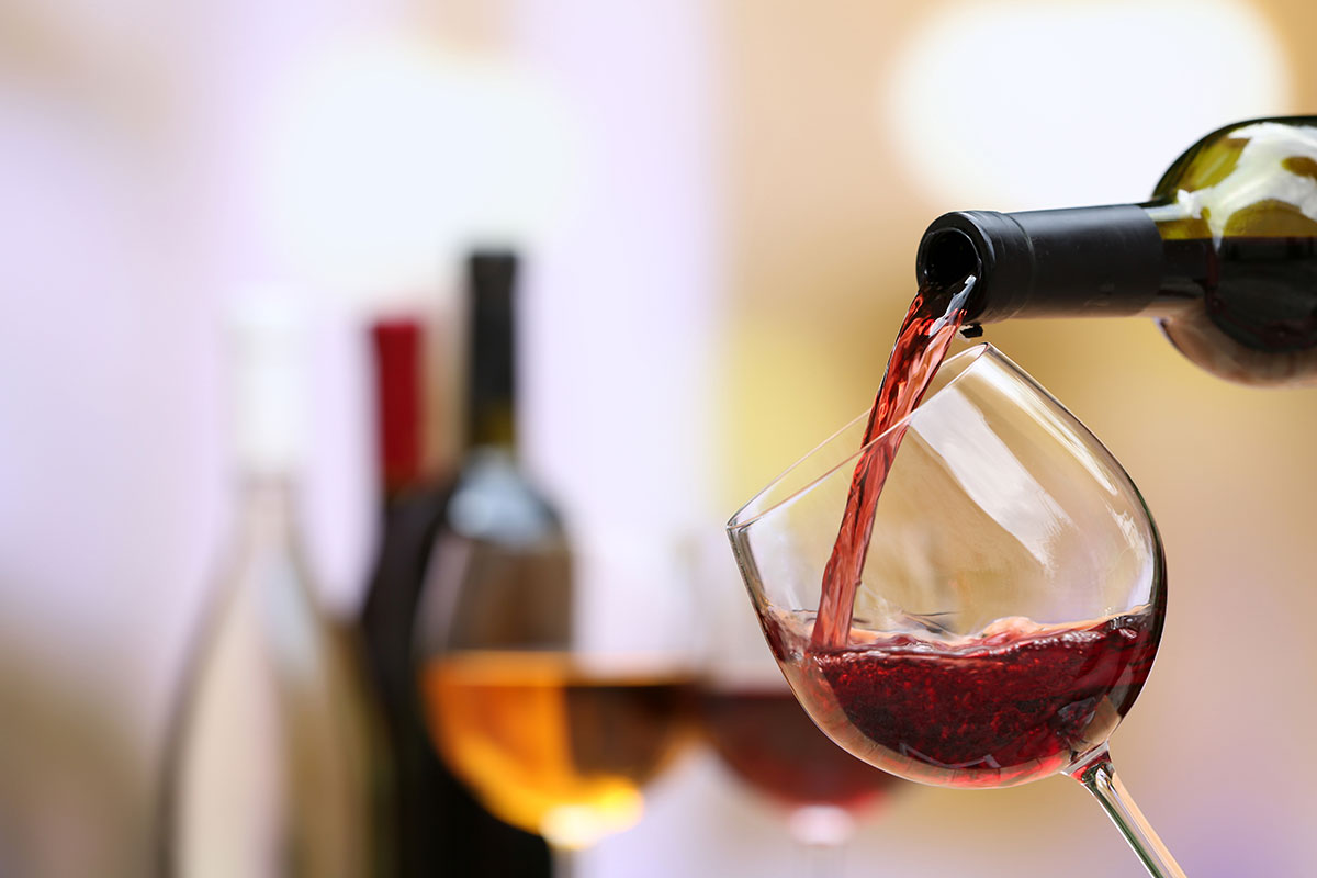 red wine poured into wine glass