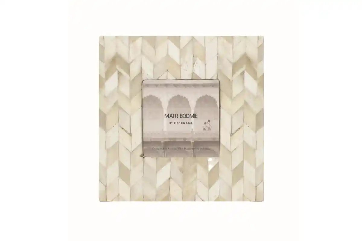 small square frame with a chevron mosaic pattern