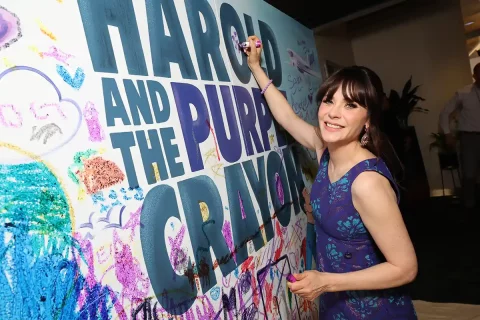 Zooey Deschanel signs Harold and the Purple Crayon sign