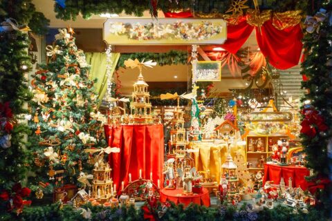 store window full of christmas decorations