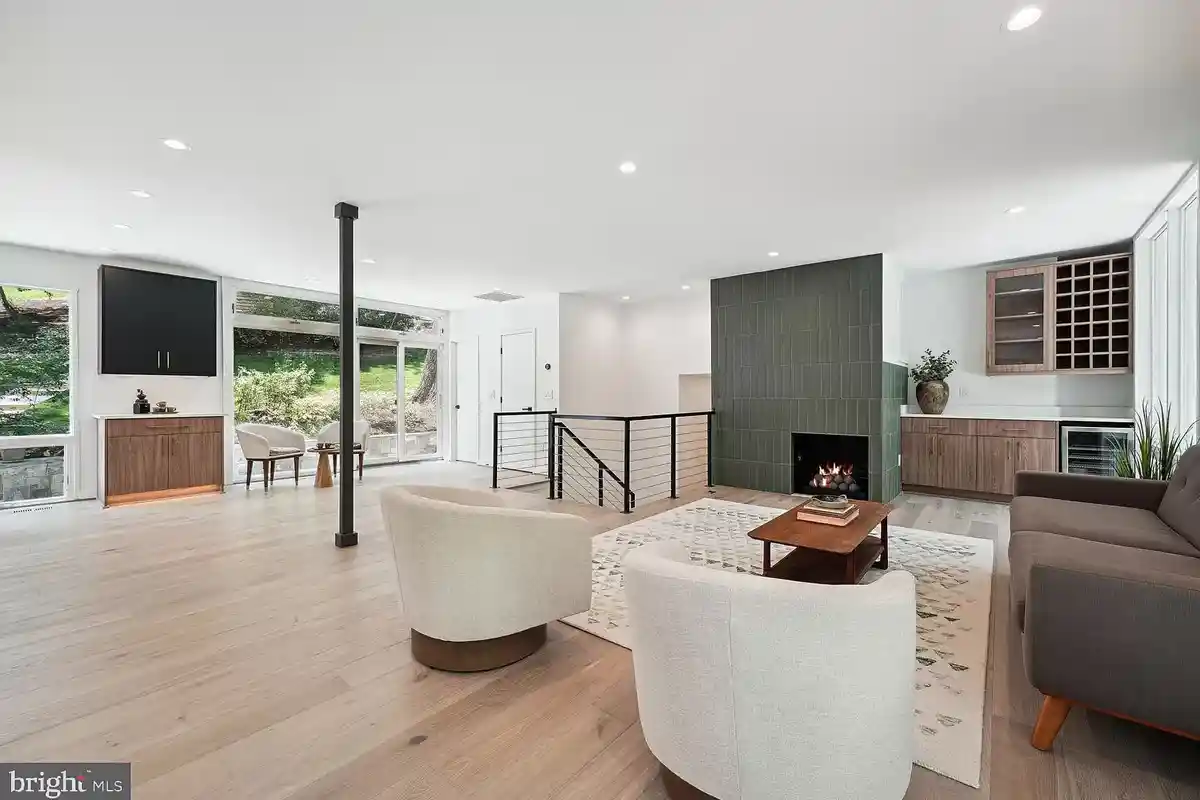 open layout family room with ceramic fireplace