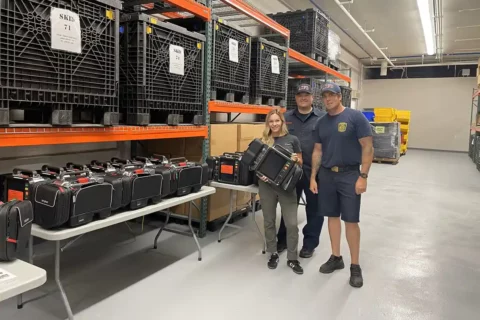 Members of Arlington County Fire Department in front of LIFEPAK 35 defibrillators