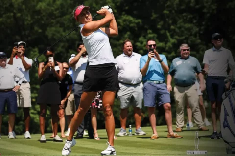 Lexi Thompson swings golf club