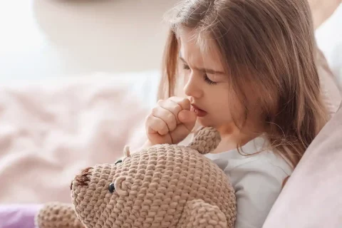 little girl coughs