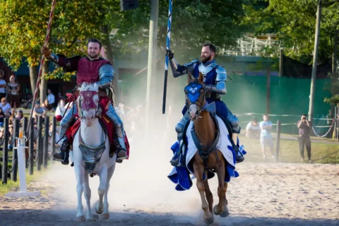Men riding horses at Renaissance Faire