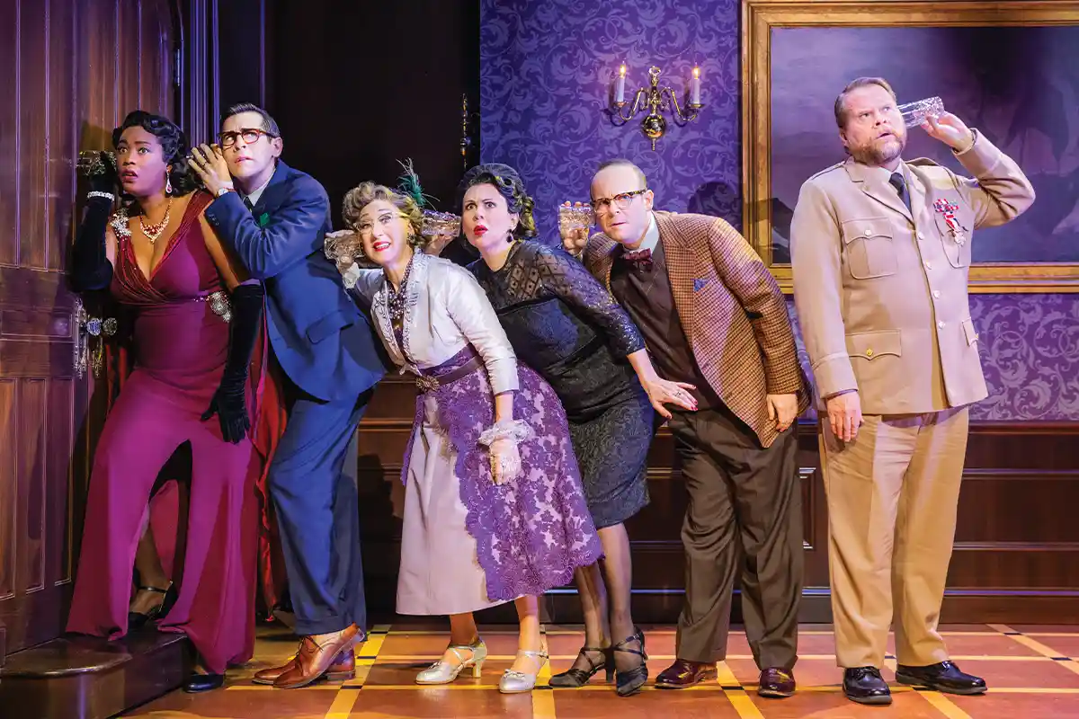 clue cast listening to door through glass cup