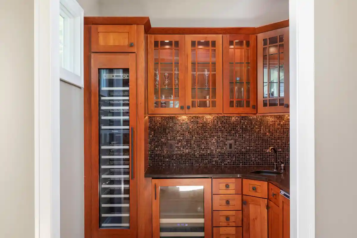 wet bar with wine cooler and beverage fridge