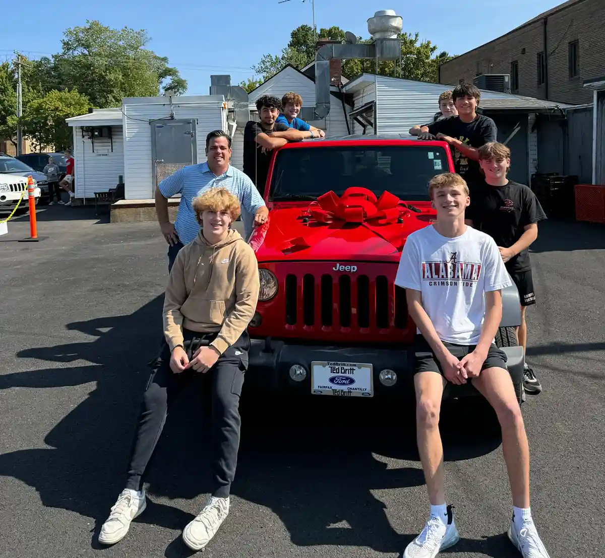 Students who helped get the Jeep for custodian Francis Apraku and Andy Britt