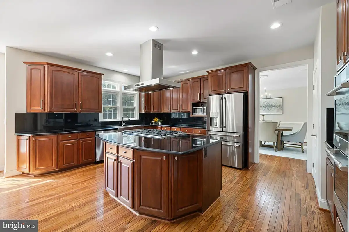 Kitchen with wood cabinets