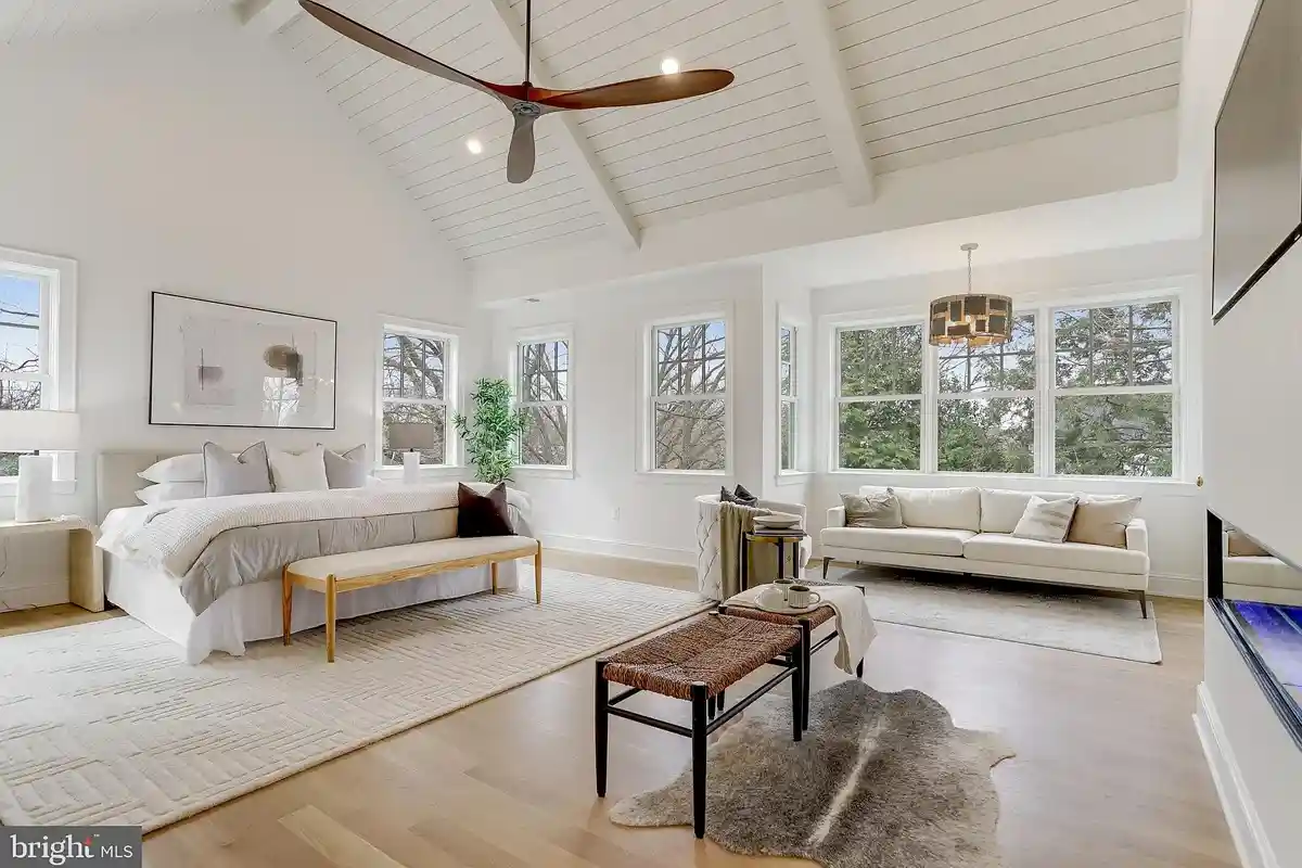 owner's bedroom with fireplace and sitting area