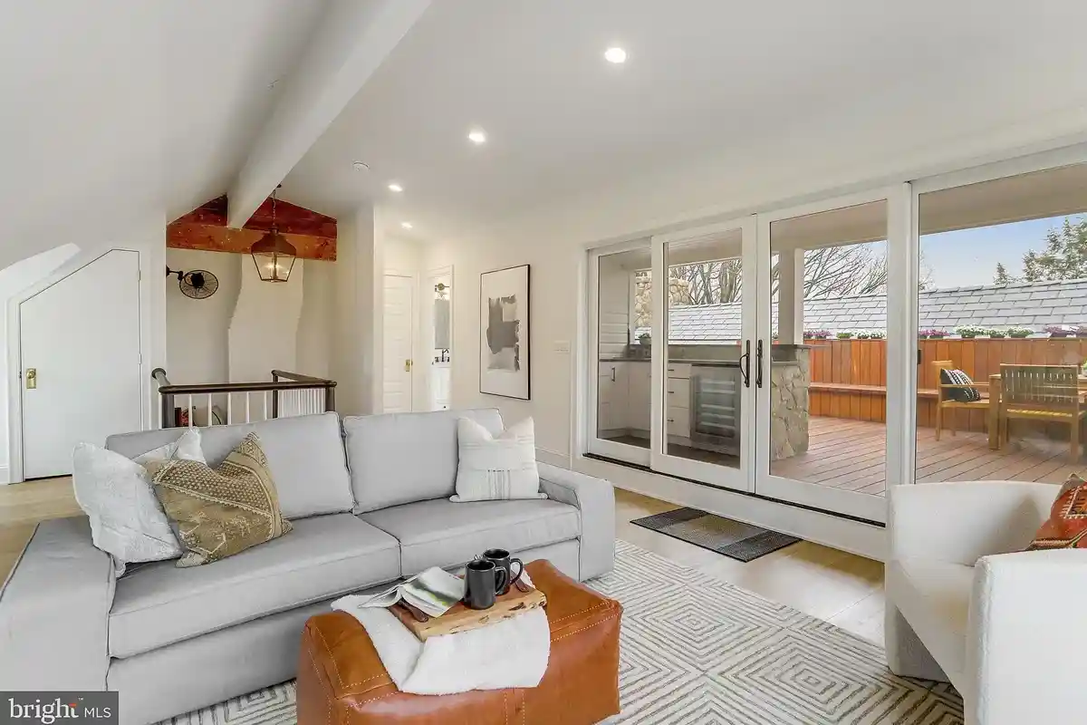 loft sitting area with access to rooftop terrace